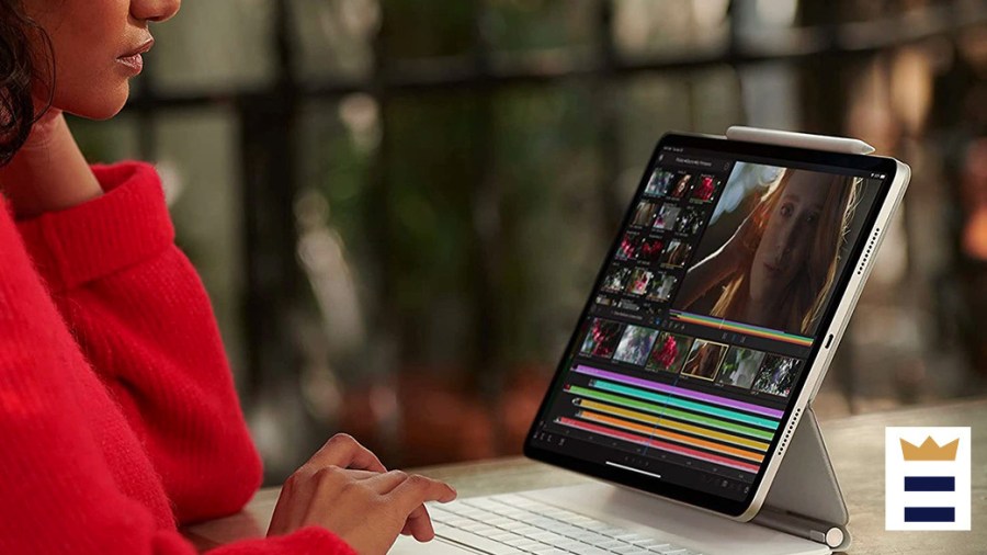 Woman using an iPad with an external keyboard