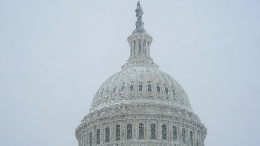 The U.S. Capitol is seen during a snow storm on Monday, January 3, 2022. The Washington, D.C., area is forecasted to receive five to six inches of snow before the afternoon.