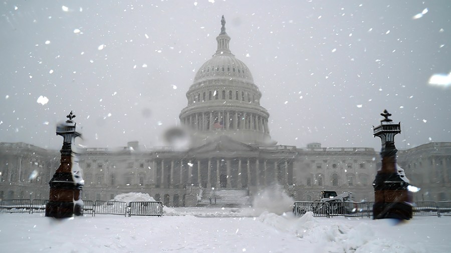 The U.S. Capitol is seen during a snow storm on Monday, January 3, 2022. The Washington, D.C., area is forecasted to receive five to six inches of snow before the afternoon.