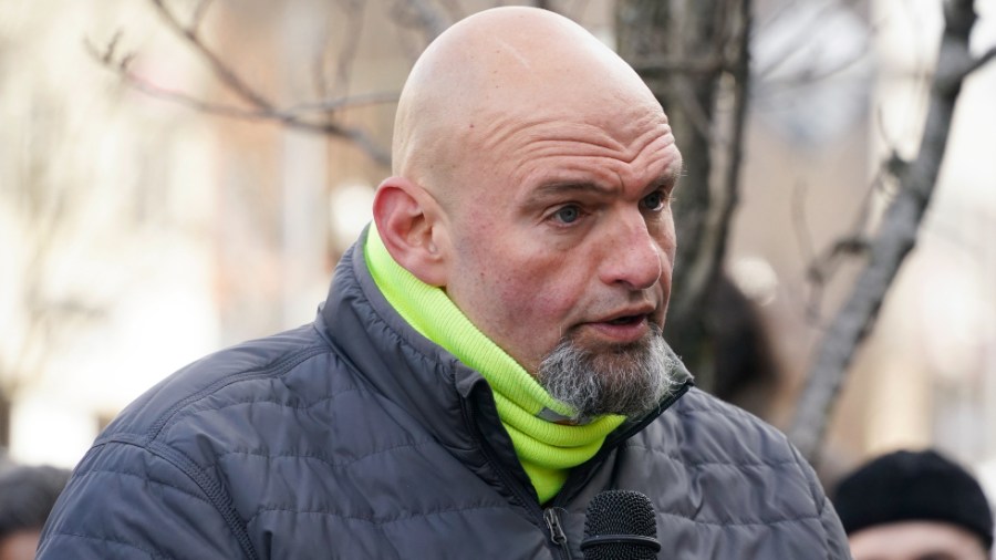 Pennsylvania Lt. Gov. and Senate candidate John Fetterman speaks at a rally supporting unionization efforts at a Pittsburgh coffee shop