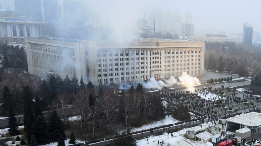 Smoke rises from the city hall building during a protest in Almaty, Kazakhstan