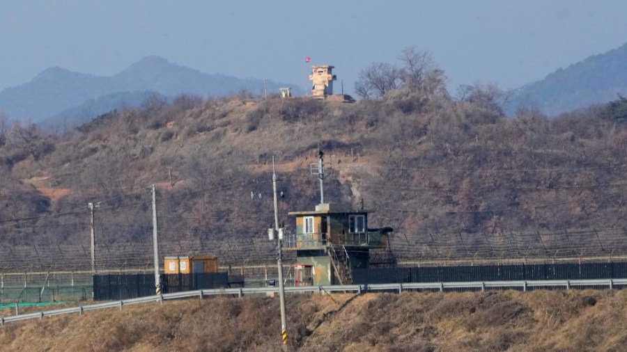 Military guard posts of North Korea, rear, and South Korea, front, are seen in Paju, near the border with North Korea, South Korea