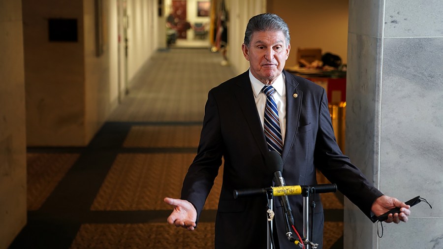 Sen. Joe Manchin (D-W.Va.) addresses reporters to discuss Covid-19 on Tuesday, January 4, 2022. He also took questions regarding Build Back Better and other legislative issues.