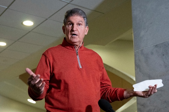 Sen. Joe Manchin, D-W.Va., responds to questions from reporters