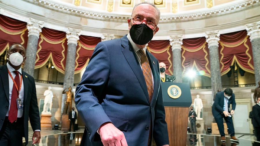 Majority Leader Charles Schumer (D-N.Y.) is seen walking through Statuary Hall of the U.S Capitol in Washington, D.C., before President Biden and Vice President Harris give remarks on Thursday, January 6, 2022.