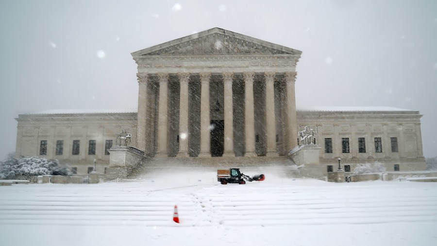 The Supreme Court is seen during a snow storm on Monday, January 3, 2022. The Washington, D.C., area is forecasted to receive five to six inches of snow before the afternoon.