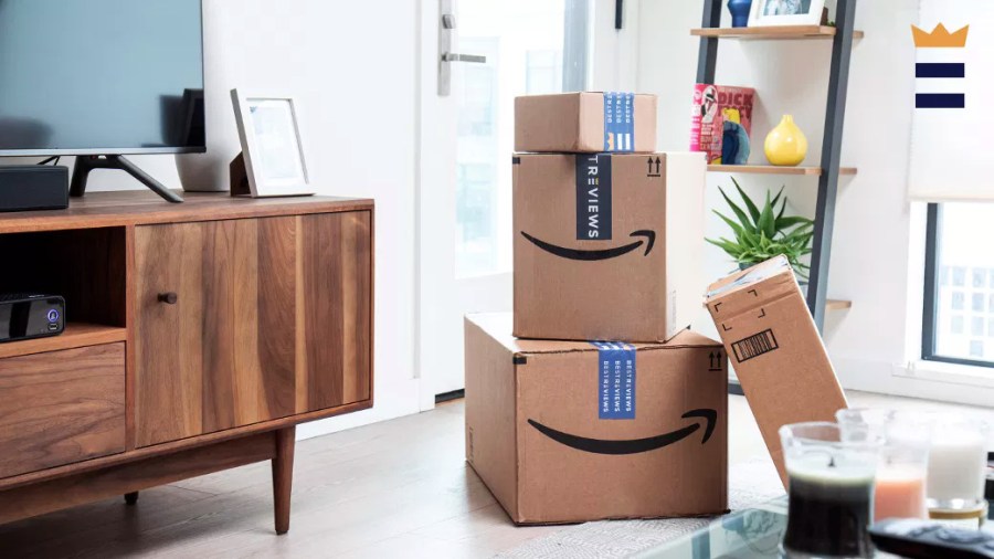 Amazon Prime boxes stacked in a living room floor