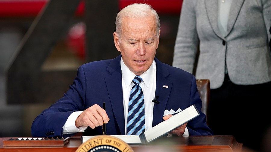 President Biden signs an executive order regarding project labor agreements at Irownworks Local 5 in Upper Marlboro, Md., on Friday, February 4, 2022.