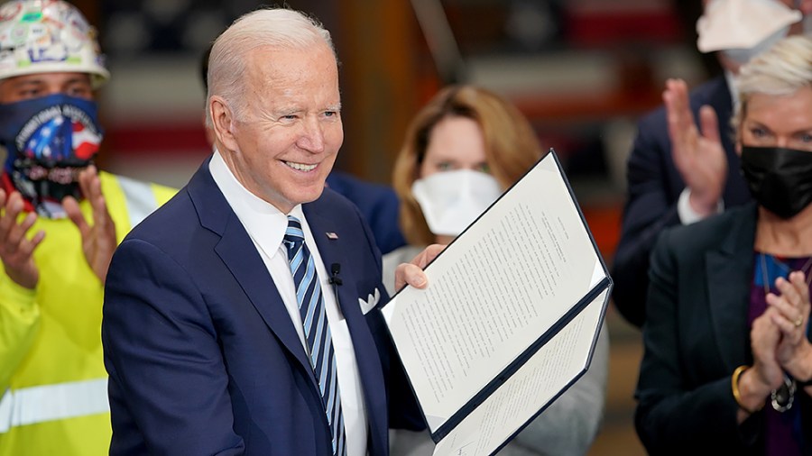 President Biden signs an executive order regarding project labor agreements at Irownworks Local 5 in Upper Marlboro, Md., on Friday, February 4, 2022.