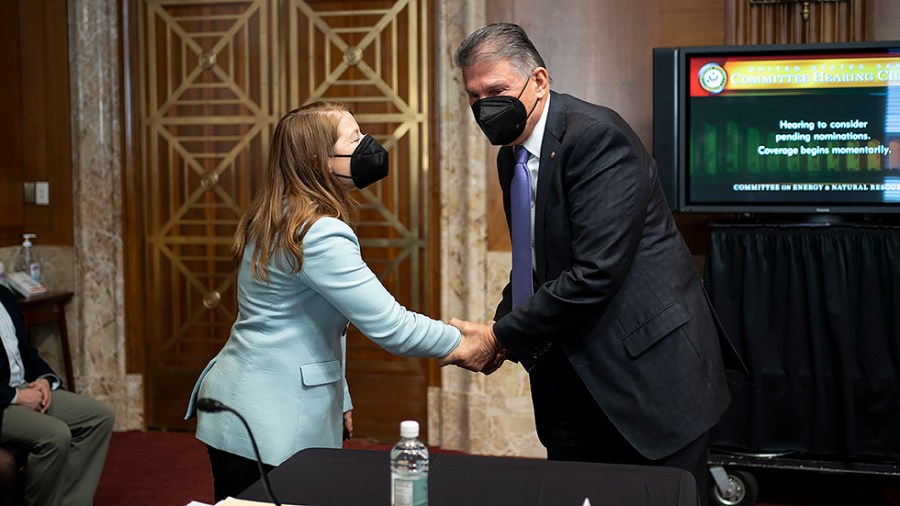 Sen. Joe Manchin (D-W.Va.) greets Laura Daniel-Davis to be an Assistant Secretary of the Interior before her nomination hearing before the Senate Energy and Natural Resources Committee on Tuesday, February 8, 2022.