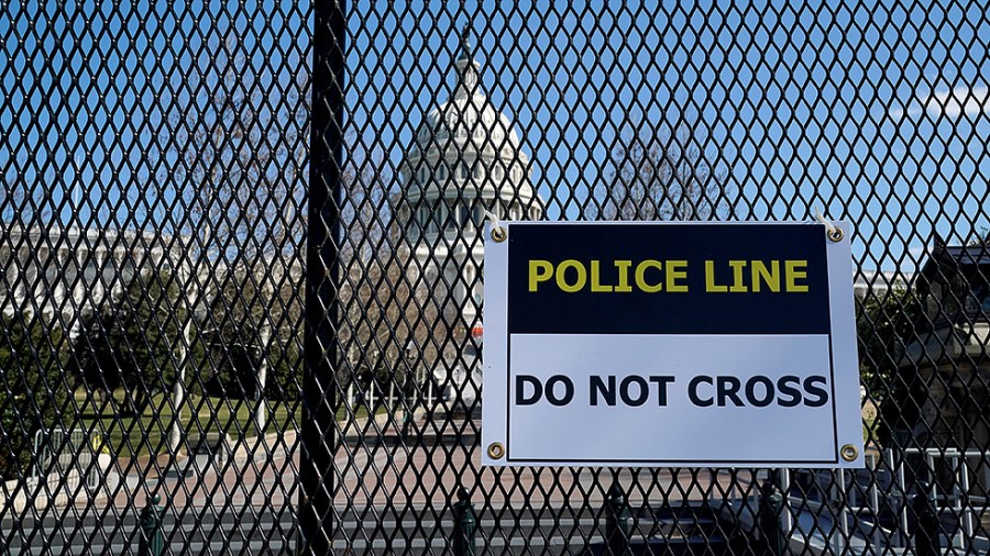 The U.S. Capitol is seen with temporary fencing from First St. N.W., on Monday, February 28, 2022. Temporary fencing was put in place prior to the State of the Union on March 1.