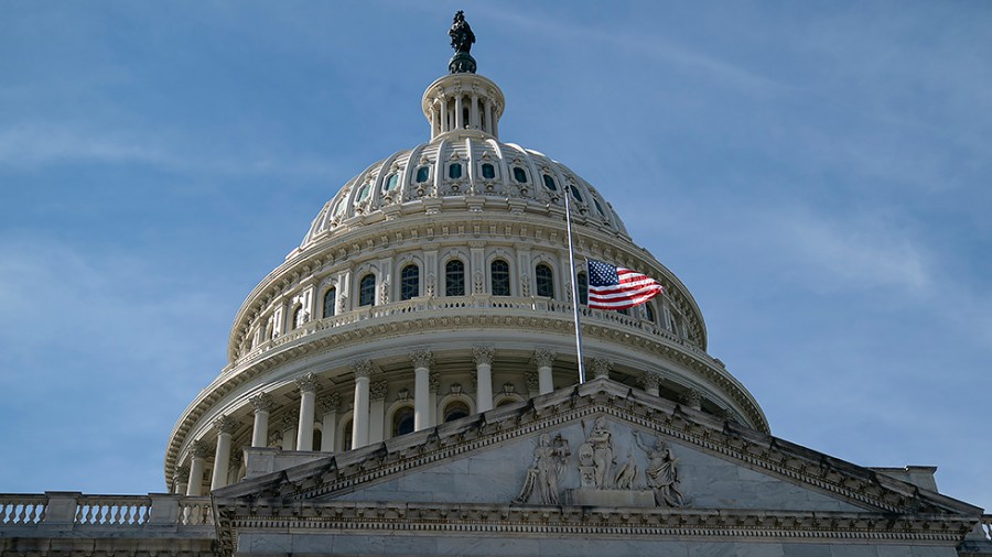 The American flag is flown at half-staff at the U.S. Capitol on Wednesday, February 23, 2022.