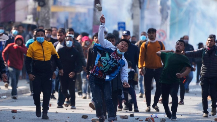 Nepalese protesters opposing a proposed U.S. half billion dollars grant for Nepal clash with police