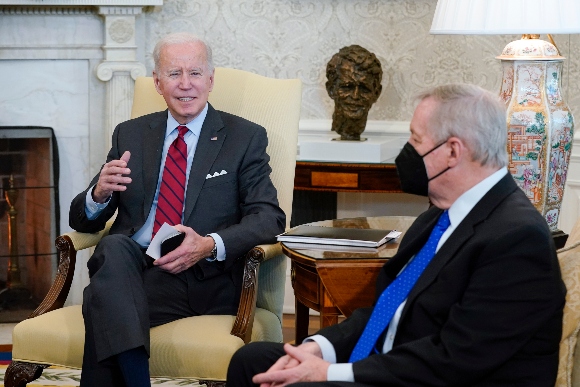 President Joe Biden speaks in the Oval Office