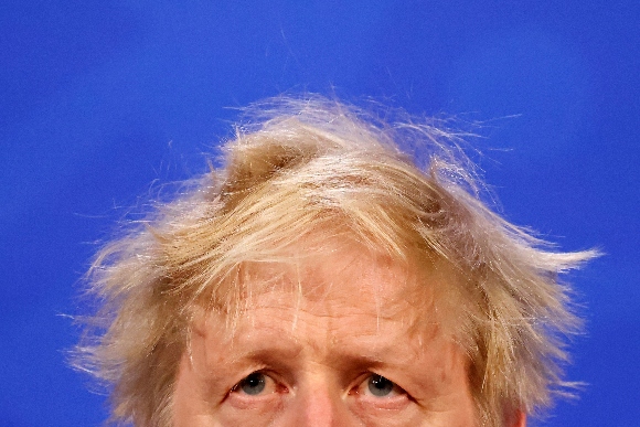 Britain's Prime Minister Boris Johnson speaks during a media briefing