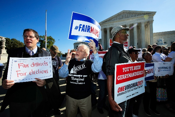 Demonstrators rally for a fair election outside the U.S. Supreme Court