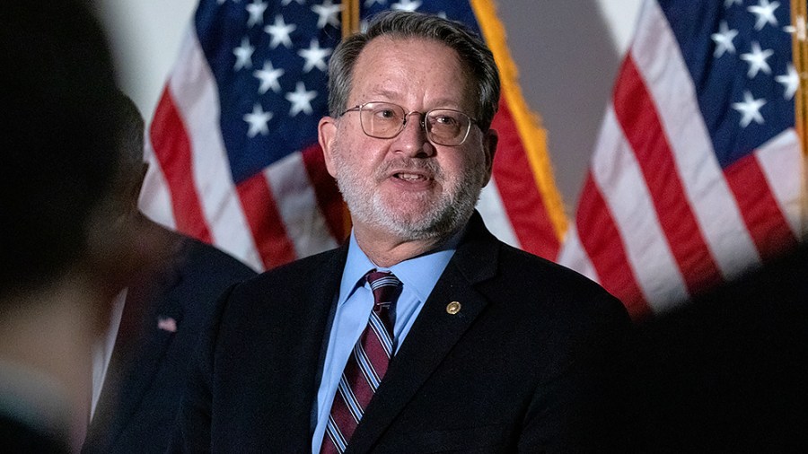 Senator Gary Peters (D-MI) speaks to the press during a post-luncheon conference at the U.S. Capitol in Washington, D.C. on Tuesday, February 8, 2022.