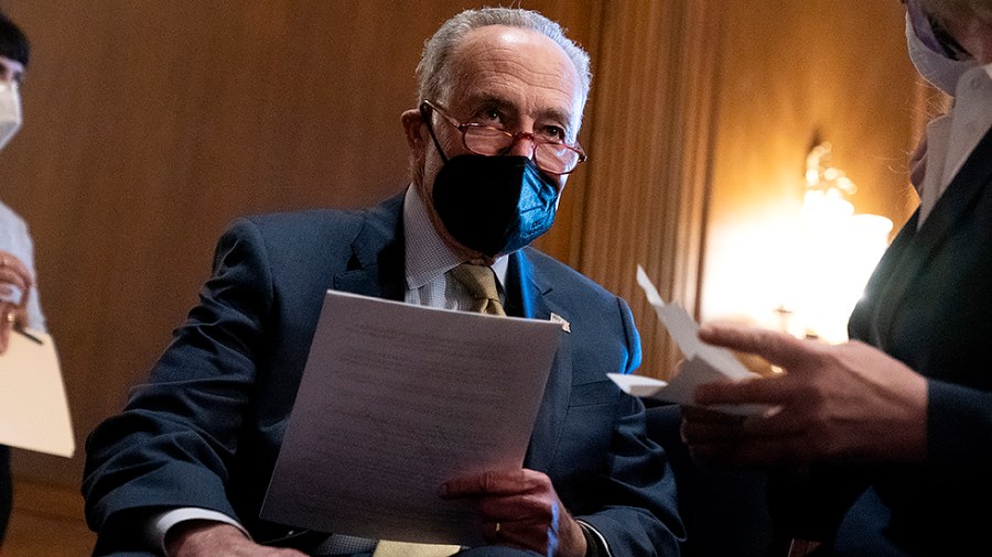 Sens. Richard Blumenthal (D-Conn.), Charles Schumer (D-N.Y.) and Tammy Baldwin (D-Wis.) chat before a press conference on Monday, February 28, 2022 to discuss the Women’s Health Protection Act prior to its’ vote.