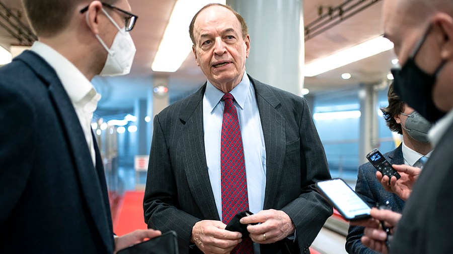 Sen. Richard Shelby (R-Ala.) speaks to reporters in the basement of the Capitol on his way to a votes regarding judicial nominations on Wednesday, February 2, 2022.