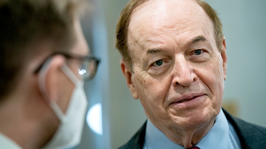 Sen. Richard Shelby (R-Ala.) speaks to reporters in the basement of the Capitol on his way to a votes regarding judicial nominations on Wednesday, February 2, 2022.