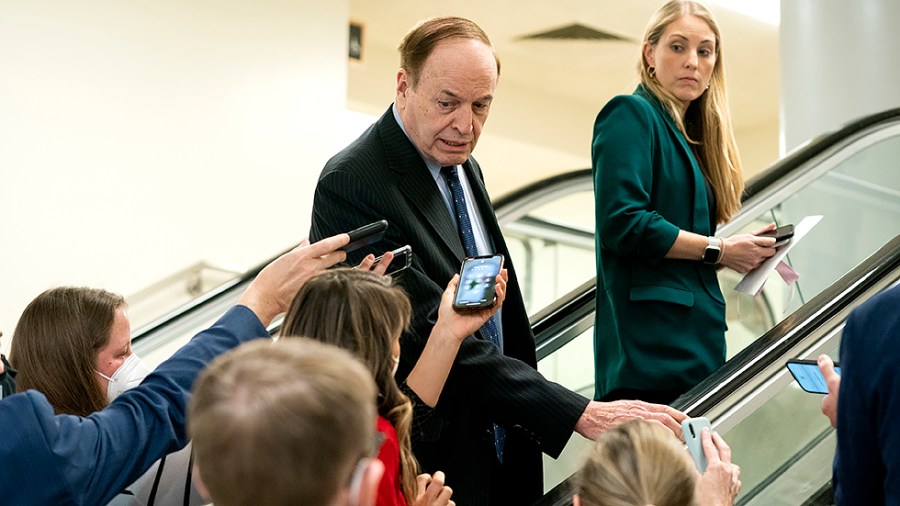 Sen. Richard Shelby (R-Ala.) speaks to reporters as he arrives to the Capitol for a series of votes regarding nominations on Monday, February 7, 2022.