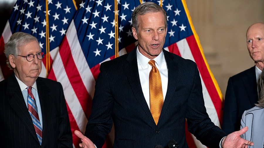 Sen. John Thune (R-S.D.) addresses reporters after the weekly policy luncheon on Tuesday, February 8, 2022.