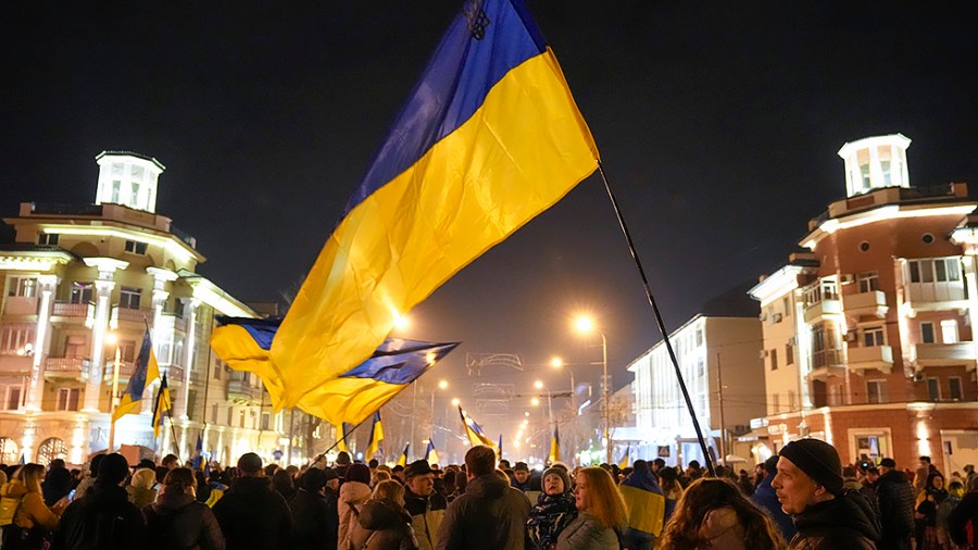 Ukrainians gather for "Mariupol is Ukraine" in Mariupol, Ukraine, Tuesday, Feb. 22, 2022. Russian lawmakers on Tuesday authorized President Vladimir Putin to use military force outside the country — a move that could presage a broader attack on Ukraine.