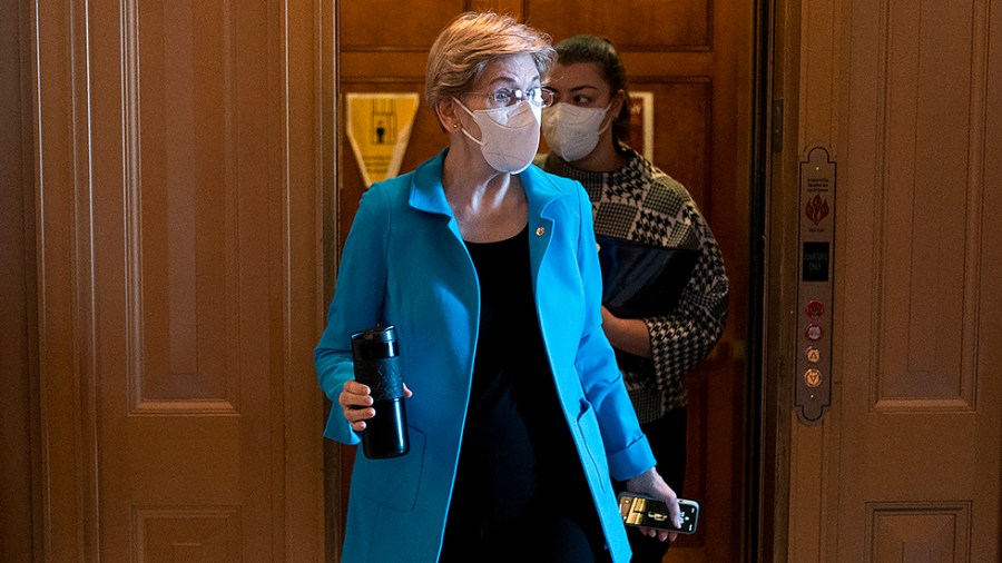 Sen. Elizabeth Warren (D-Mass.) arrives to the Senate Chamber for a series of votes regarding nominations on Tuesday, February 1, 2022.