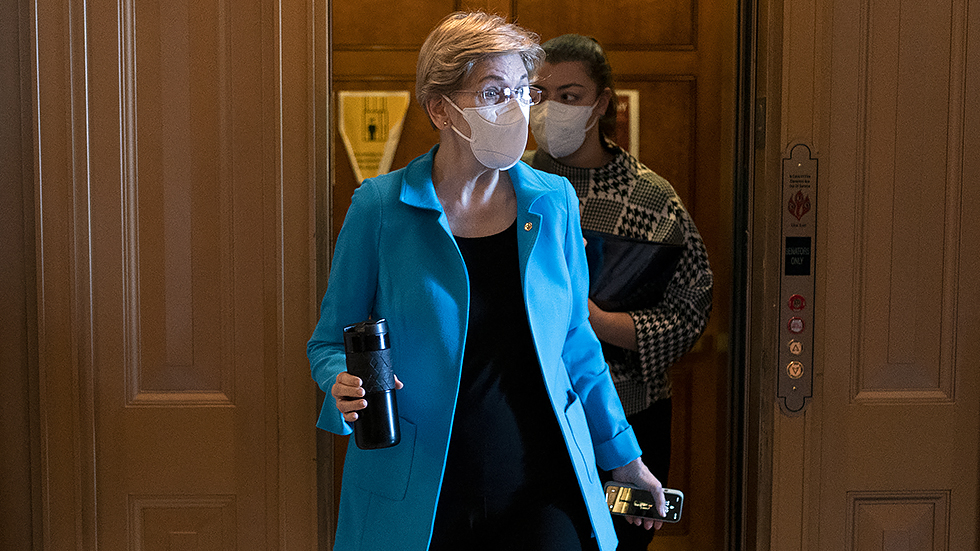 Sen. E Warren (D-Mass.) arrives to the Senate Chamber for a series of votes regarding nominations on Tuesday, February 1, 2022.