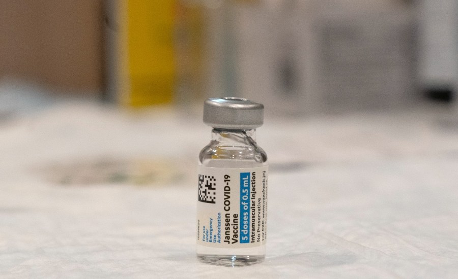 bottle of Johnson & Johnson Janssen coronavirus vaccine on a table