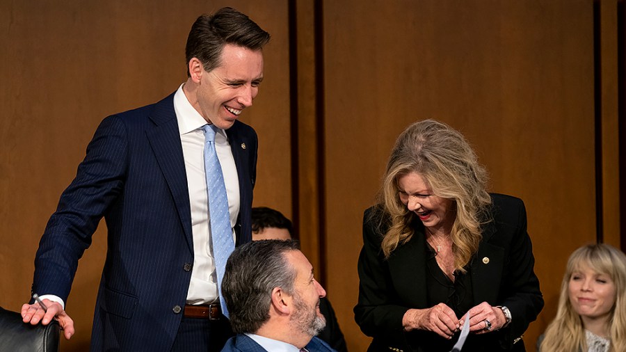 Sens. Josh Hawley (R-Mo.), Ted Cruz (R-Texas) and Marsha Blackburn (R-Tenn.) chat during a break in the third day of the Senate Judiciary Committee confirmation hearing of Supreme Court nominee Ketanji Brown Jackson on Wednesday, March 23, 2022.