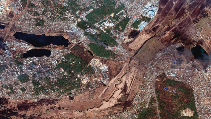 This satellite image provided by Maxar Technologies shows an overview of burning buildings and craters in Irpin and Horenka, Ukraine