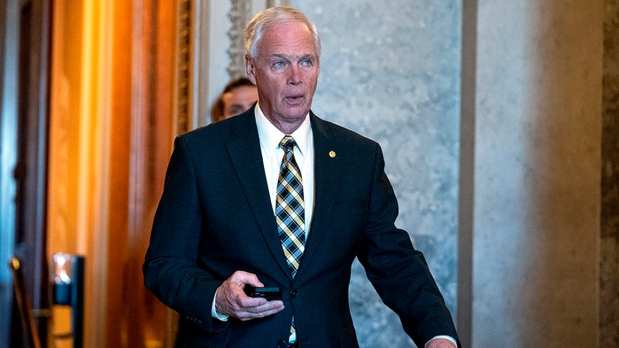 Sen. Ron Johnson (R-Wis.) leaves the Senate Chamber following the nomination vote of Shalanda Young to be Director of OMB on Tuesday, March 15, 2022.