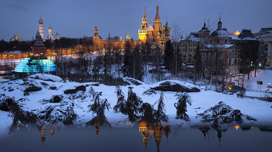 The Kremlin is seen after sunset from Zaryadye Park near Red Square in Moscow