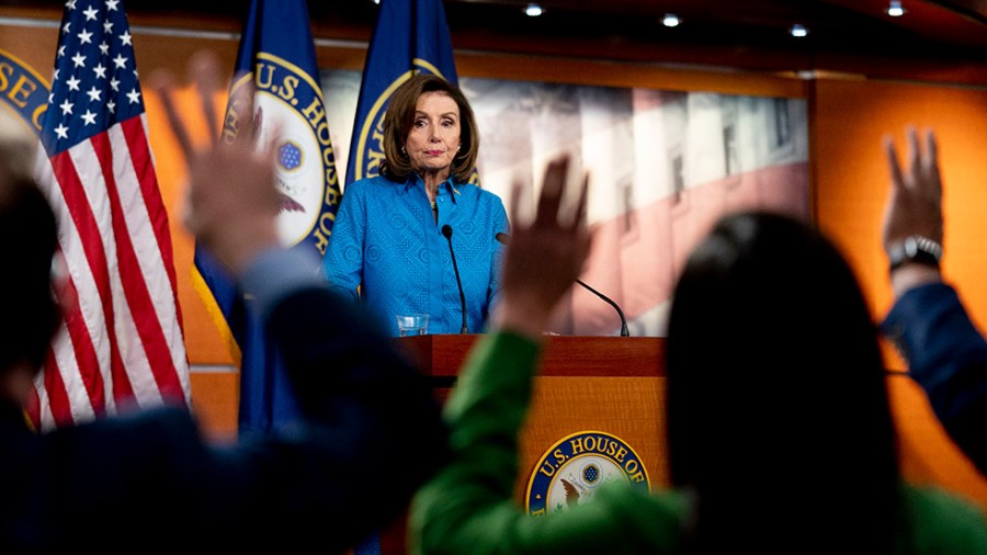 House Speaker Nancy Pelosi (D-Calif). calls on a reporter