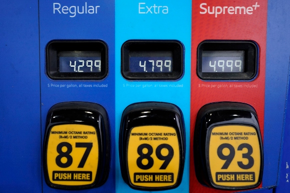 Gas prices appear on a pump at a gas station