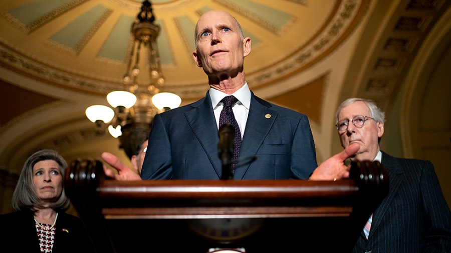 Sen. Rick Scott (R-Fla.) addresses reporters after the weekly policy luncheon on Tuesday, March 22, 2022.