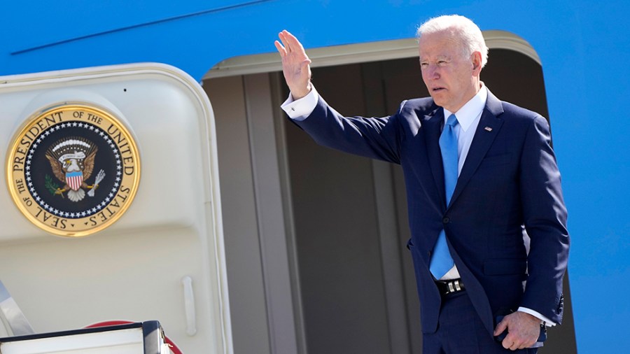 President Biden waves from Air Force One.