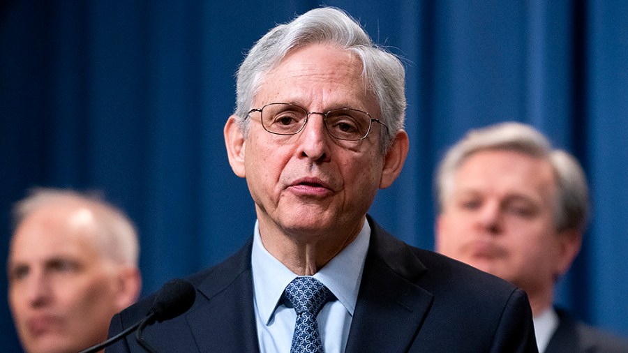 Attorney General Merrick Garland addresses reporters during a press conference on Wednesday, April 6, 2022 at the Department of Justice in Washington, D.C., to announce enforcement actions over criminal Russian activity involving crypto currency.