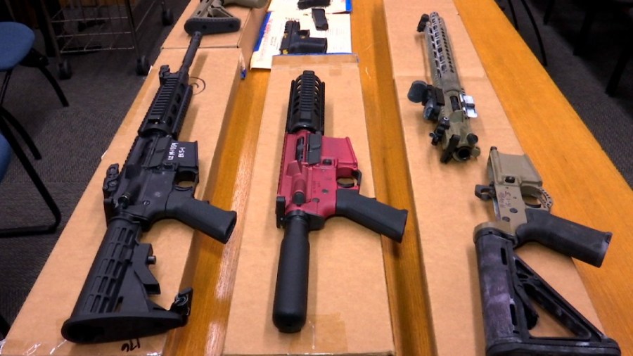 This Nov. 27, 2019, file photo shows "ghost guns" on display at the headquarters of the San Francisco Police Department in San Francisco