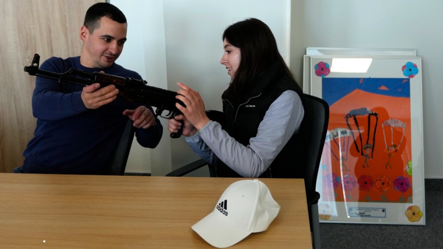 Ukrainian nationals get training at a shooting range in Brno, Czech Republic