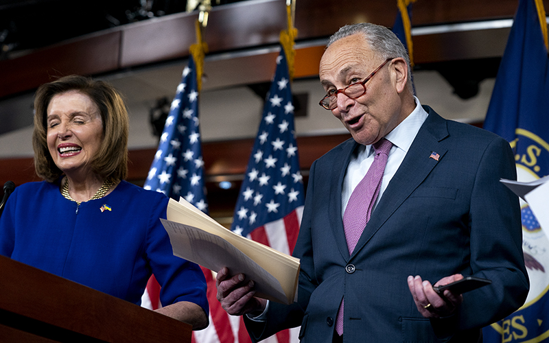 Majority Leader Charles Schumer (D-N.Y.) reacts to Speaker Nancy Pelosi’