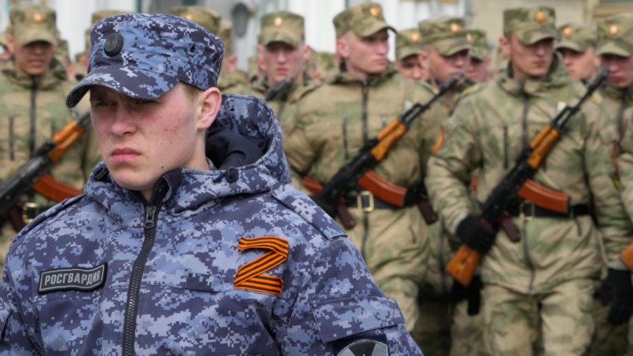 A soldier of Russian Rosguardia wears an attached letter Z, which has become a symbol of the Russian military