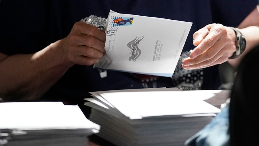 An election worker counts ballots in the Pennsylvania primary election