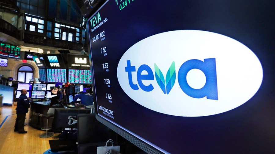 The logo for Teva appears above the floor of the New York Stock Exchange