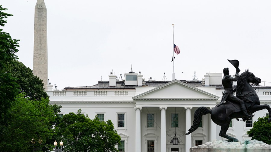 The flags fly at half-staff over the White House