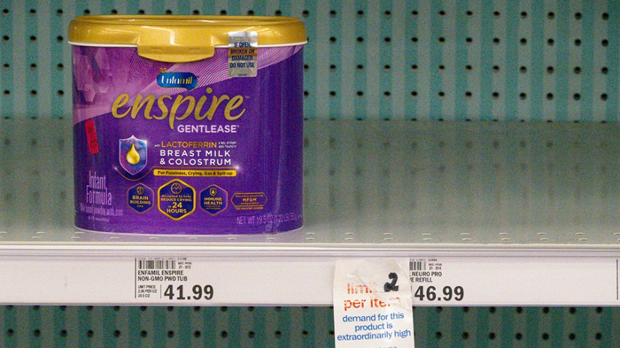 Baby formula is displayed on the shelves of a grocery store