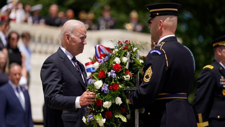 President Joe Biden lays a wreath at The Tomb of the Unknown Soldier at Arlington National Cemetery on Memorial Day