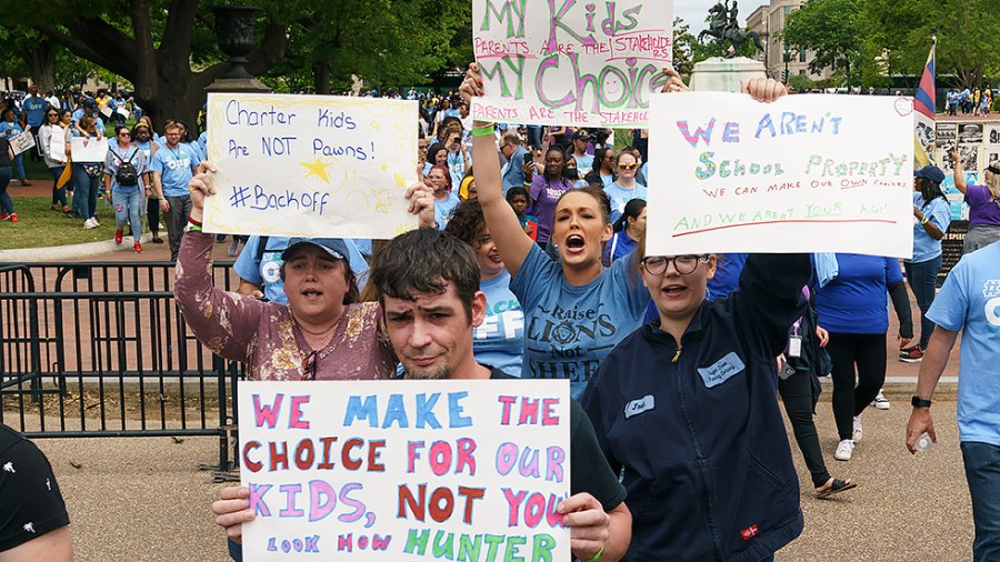 Students, parents and educators with National Alliance for Public Charter Schools hold a rally outside the White House on Wednesday, May 11, 2022 as the Biden administration is proposing tougher regulations for charter schools to receive funding.