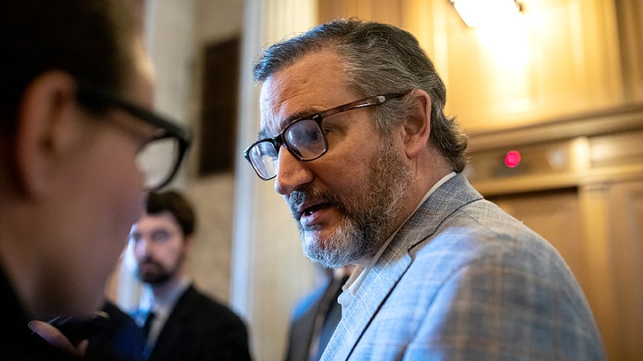 Sen. Ted Cruz (R-Texas) pauses to speak with reporters as he exits the U.S. Capitol following a vote on Monday, May 2, 2022.